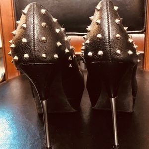 Gold stiletto heels with gold studs